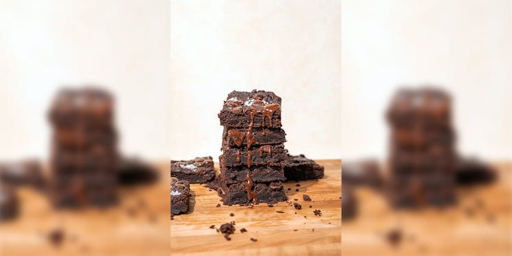 Chickpea brownies stacked on top of each other. 