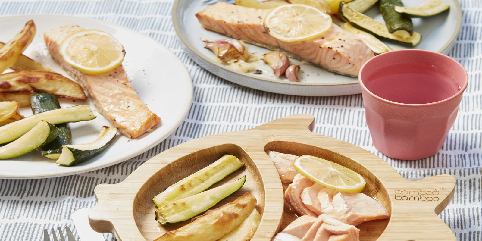 One-pan salmon with zucchini and potato wedges