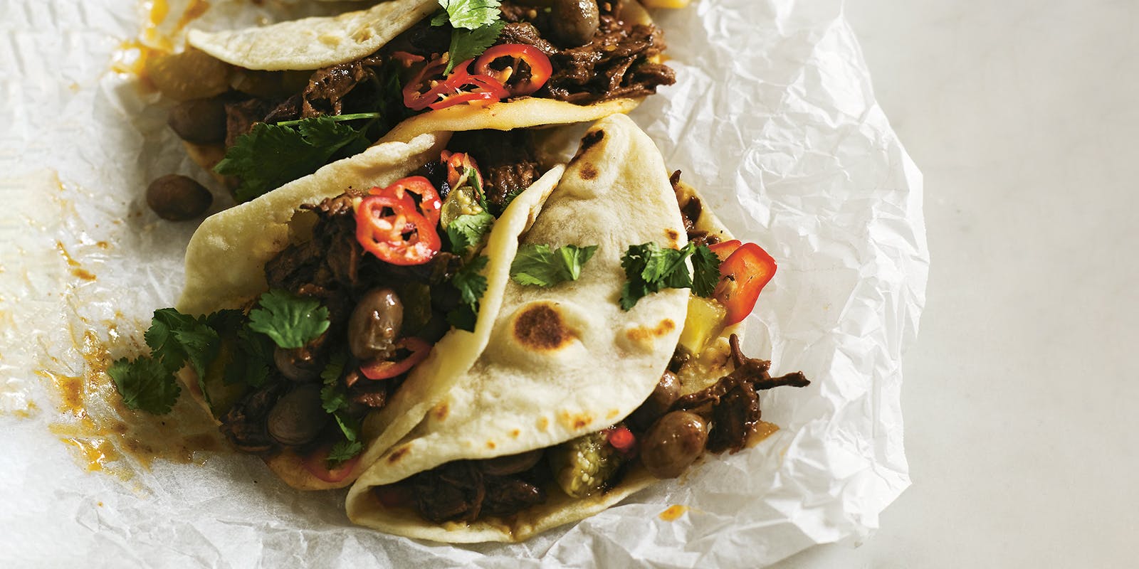 Soft Tacos with Shredded Brisket and Tomatillos
