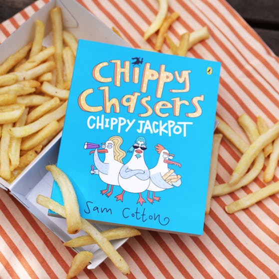 Photo of Chippy Chasers books on a box of chips. 