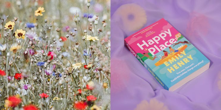 A field of wildflowers next to the book 'Happy Place' by Emily Henry. 
