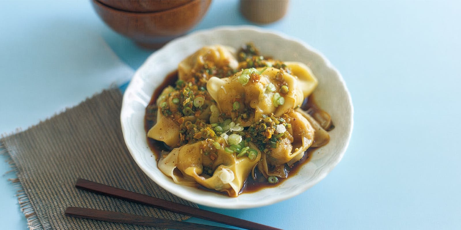 Prawn wontons with spring onion, ginger and vinegar dressing